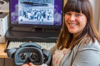 Aue-Bad Schlema schafft VR-Brillen für einen virtuellen Stadtrundgang an. Lydia Schlösinger, Mitarbeiterin der Abteilung Kultur bei der Stadtverwaltung, hat sie schon mal getestet. 