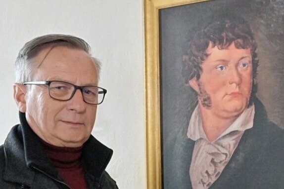 Als ein Schneeberger das Silber für den kleinen Mann erfand - Matthias Gläser mit einer Kopie des einzigen Geitner-Porträts.