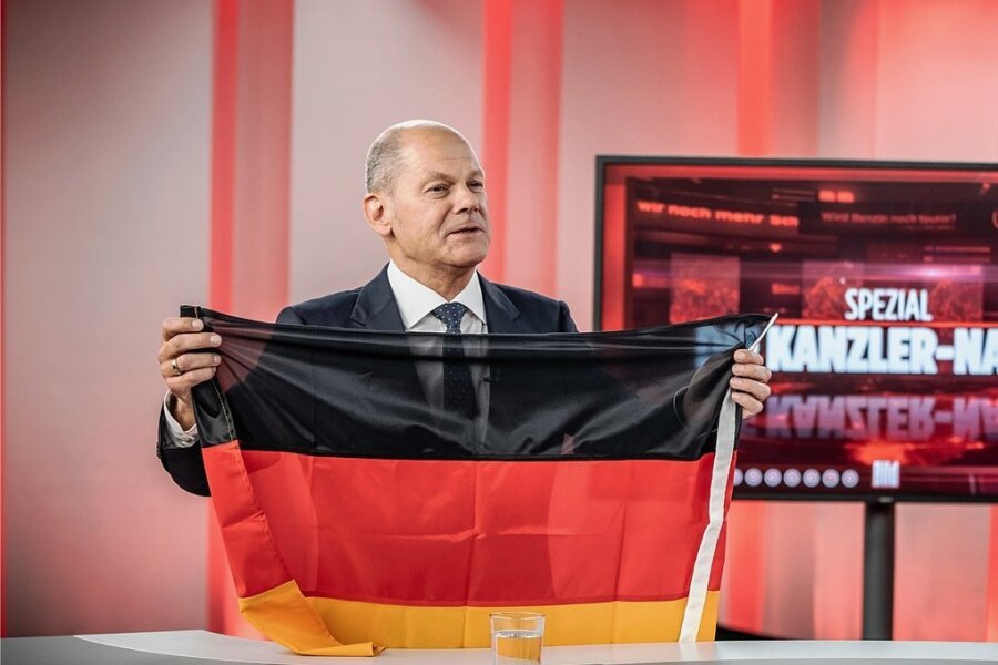 Bild-TV und die Deutschlandfahne - Olaf Scholz (SPD) sollte sich zu seinen Gefühlen beim Anblick der Deutschland-Fahne erklären. 