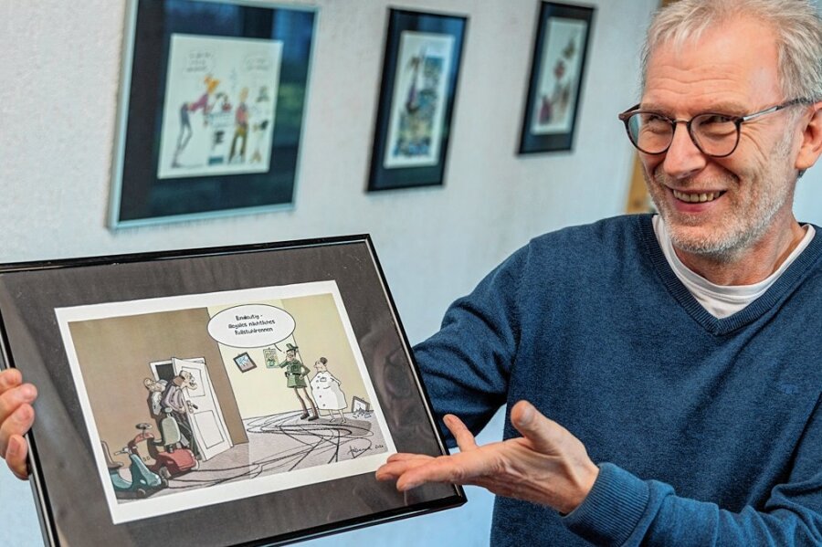 Demenz und Humor: Warum gemeinsames Lachen wichtig ist - Jörg Halsema aus Mylau hat unter anderem die preisgekrönte Karikatur "Rollstuhlrennen" für die Ausstellung in der Begegnungsstätte am Nordhorner Platz beigesteuert. 