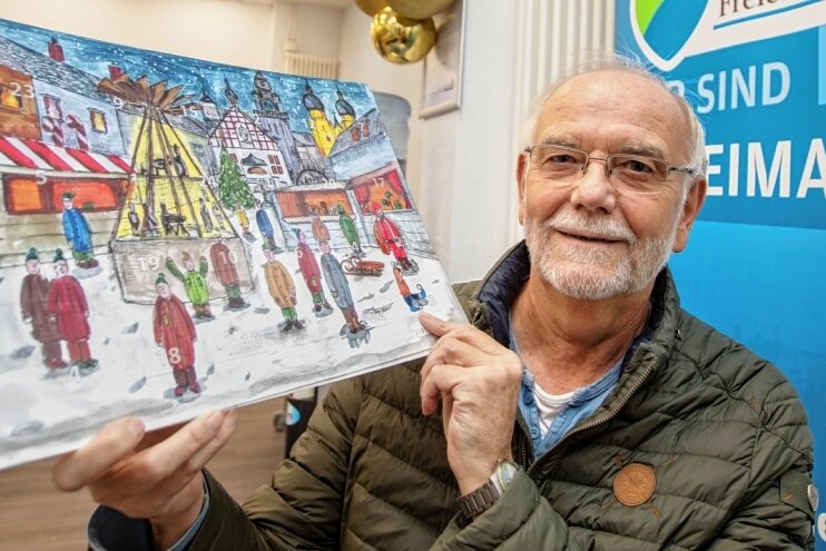 Endspurt für Verkauf von Rotary-Kalendern für den guten Zweck - Bernhard Schuberth hält den traditionellen Weihnachtskalender des vogtländischen Rotary-Clubs in den Händen.