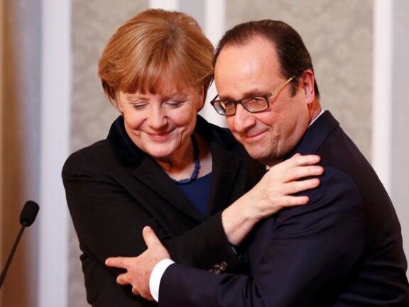 Angela Merkel und François Hollande nach den Gesprächen in Minsk. Gemeinsam rangen sie Moskau und Kiew eine Waffenruhe ab.