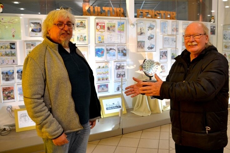Frecher Franzose lässt Karikaturen sprechen - Alain Bonnas (links) und Heinz Tonndorf laden zum 13. Kultur-Fenster in die Kolonnaden ein. 