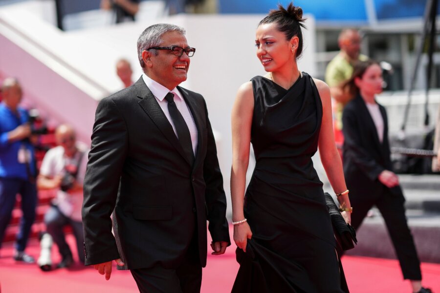Geflohener Regisseur Mohammed Rassulof in Cannes - Mohammed Rassulof stellt mit seiner Tochter Baran Rassulof seinen Film "The Seed of the Sacred Fig" in Cannes vor.