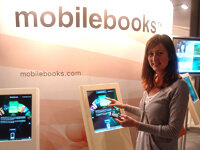 Handy als Lesegerät: Service mit kostenlosen E-Books auf der Frankfurter Buchmesse - Mobilebooks können an Terminals von Haase & Martin aufs Handy geladen werden