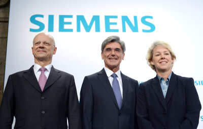 Kaum ein Dax-Vorstand in Ostdeutschland geboren - Frauenanteil steigt - Der Vorstandsvorsitzende der Siemens AG, Joe Kaeser (M), der Finanzvorstand der Siemens AG, Ralf Thomas, und Lisa Davis, Vorstand der Sparte Energie zu Beginn der Jahreshauptversammlung des Unternehmens zusammen.