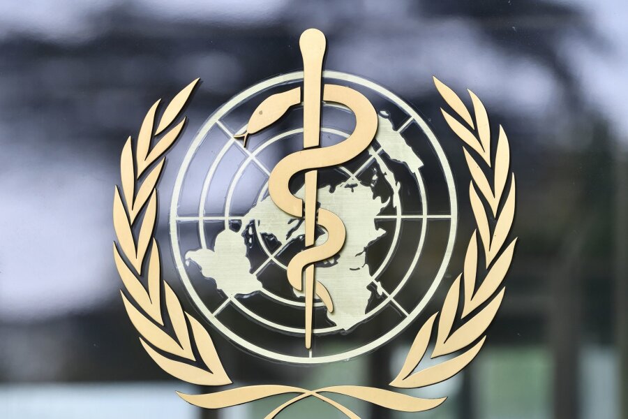 Kind mit Vogelgrippe in Indien schwer erkrankt - Logo der Weltgesundheitsorganisation (WHO) vor dem Sitz in Genf.