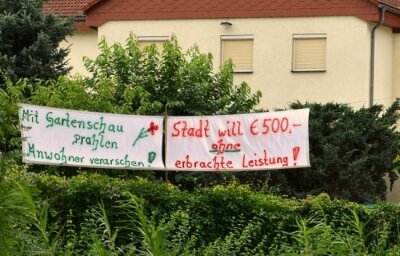 Newsletter: Das war diese Woche los in Mittelsachsen -  Mit großflächigen Parolen protestieren Anwohner der Landesgartenschau gegen empfundene Benachteiligungen. 