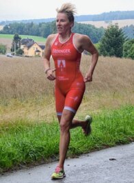 Rebesgrüner trotz dicker Regenwolken zufrieden - Siegerin Jana Richter aus Plauen war die Zeitschnellste über die halbe Distanz.