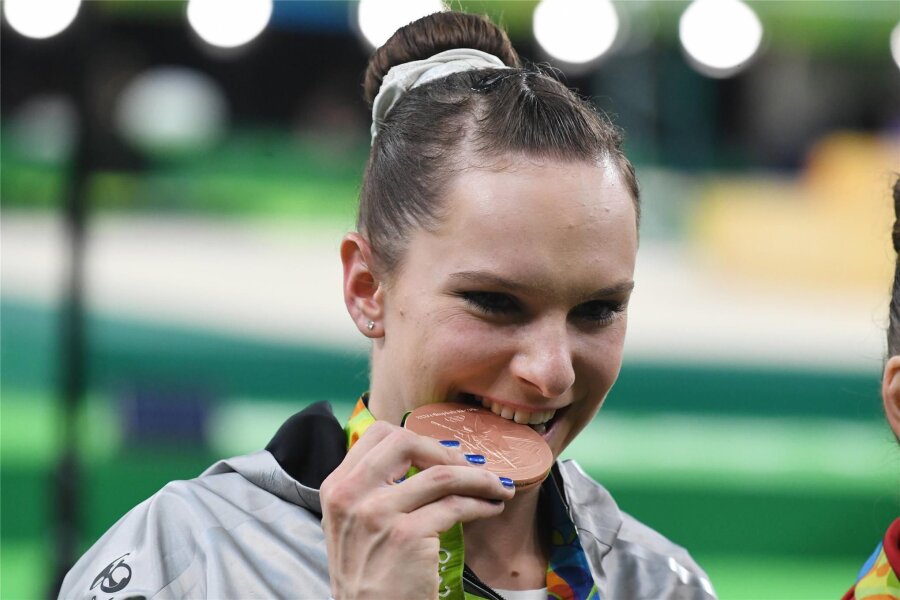 Sie turnte elegant und mit dem gewissen Drive: Jetzt beendet die Olympiadritte Sophie Scheder ihre Karriere - 2016 gewann Sophie Scheder Olympiabronze am Stufenbarren.