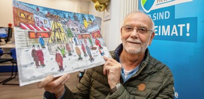 Verkauf von Kalendern im Endspurt - Bernhard Schuberth hält den Weihnachtskalender des vogtländischen Rotary-Clubs in den Händen.